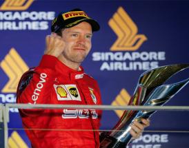 Vettel im Ferrari-Anzug
